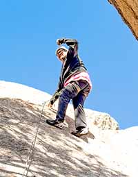 a man rock climbing
